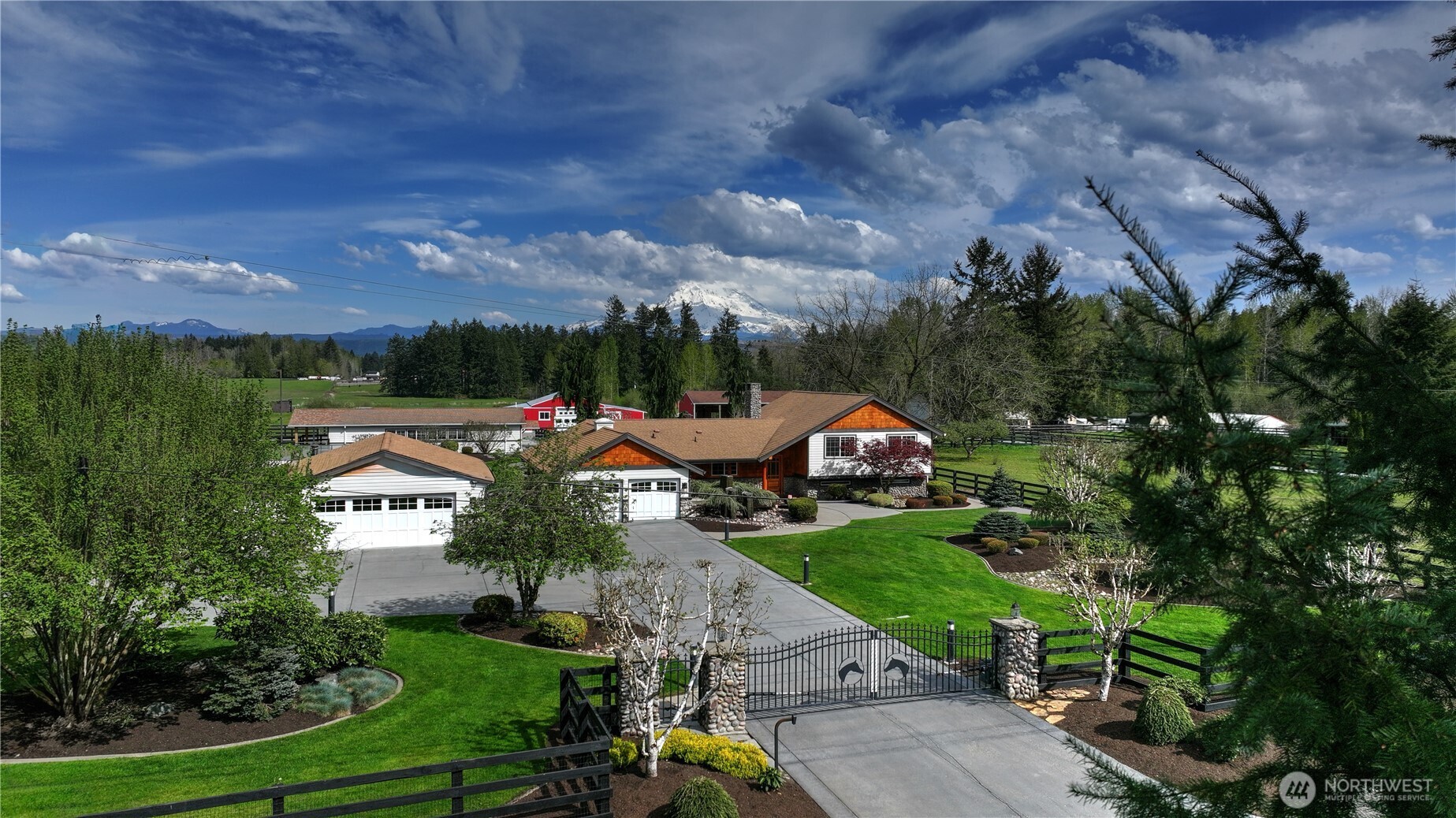 30815 Webster Road East Eatonville, WA 98328 - Photo 40 of 40 an aerial view of a house with a garden and trees