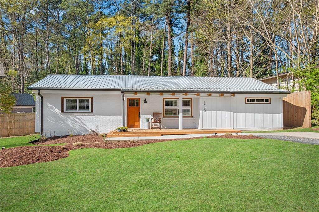 1240 Robinwood Road Decatur, GA 30033 - Photo 1 of 1 front view of a house with a yard