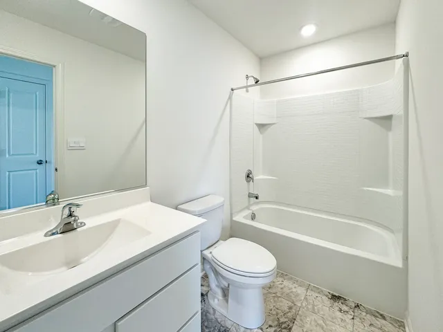 a view of balcony with two washing machine