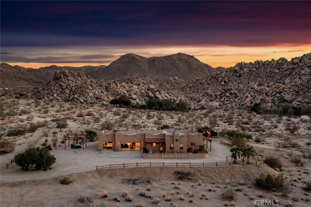7030 Mile Square Road Joshua Tree, CA 92252 - Photo 1 of 58 a view of a city