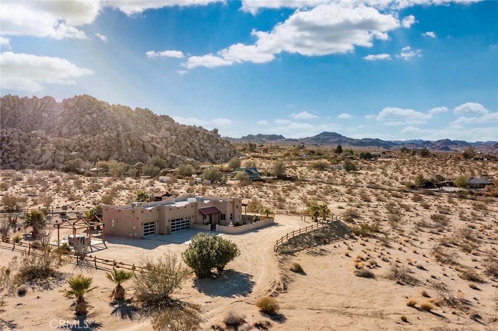 7030 Mile Square Road Joshua Tree, CA 92252 - Photo 2 of 58 a view of city and mountain