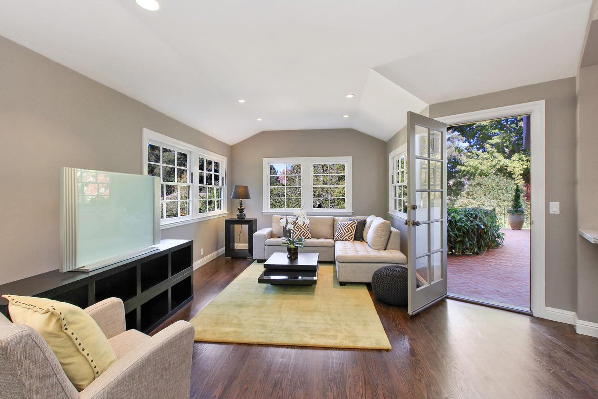 973 Baileyana Road Hillsborough, CA 94010 - Photo 13 of 35 a living room with furniture and a large window