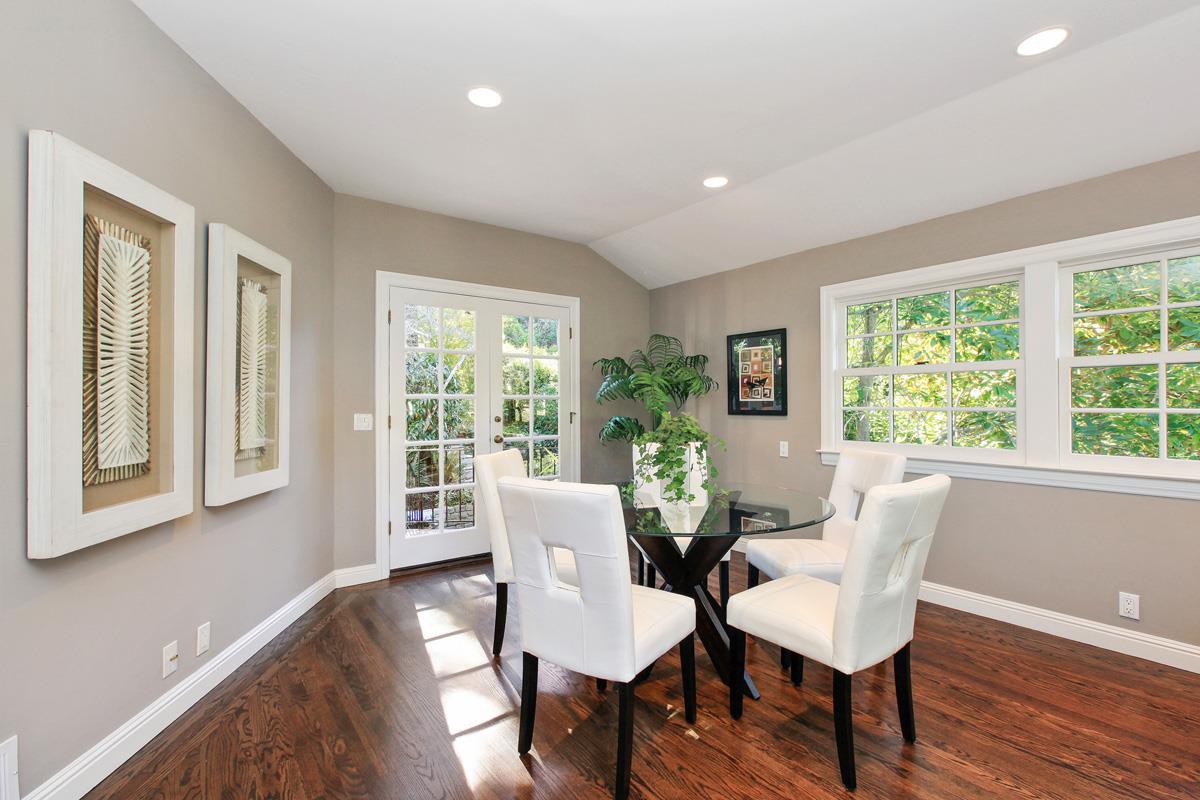 973 Baileyana Road Hillsborough, CA 94010 - Photo 14 of 35 a view of a dining room with furniture and wooden floor