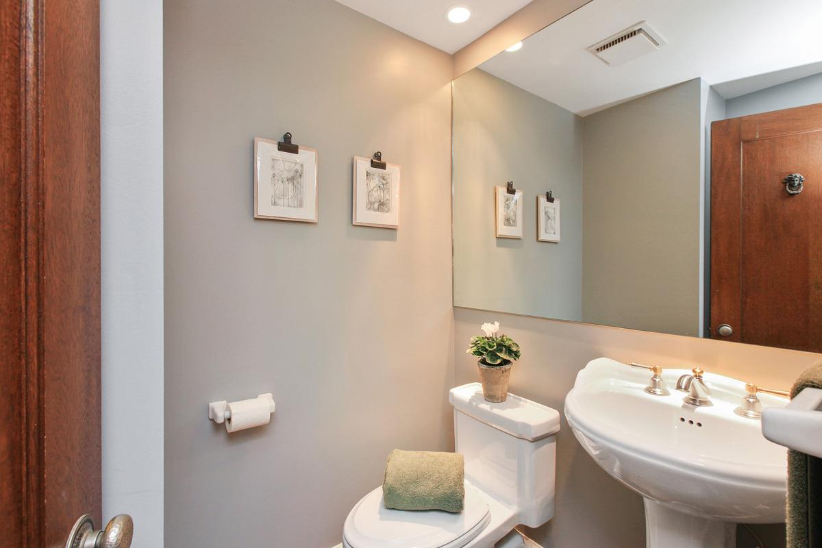 973 Baileyana Road Hillsborough, CA 94010 - Photo 18 of 35 a bathroom with a sink and a mirror