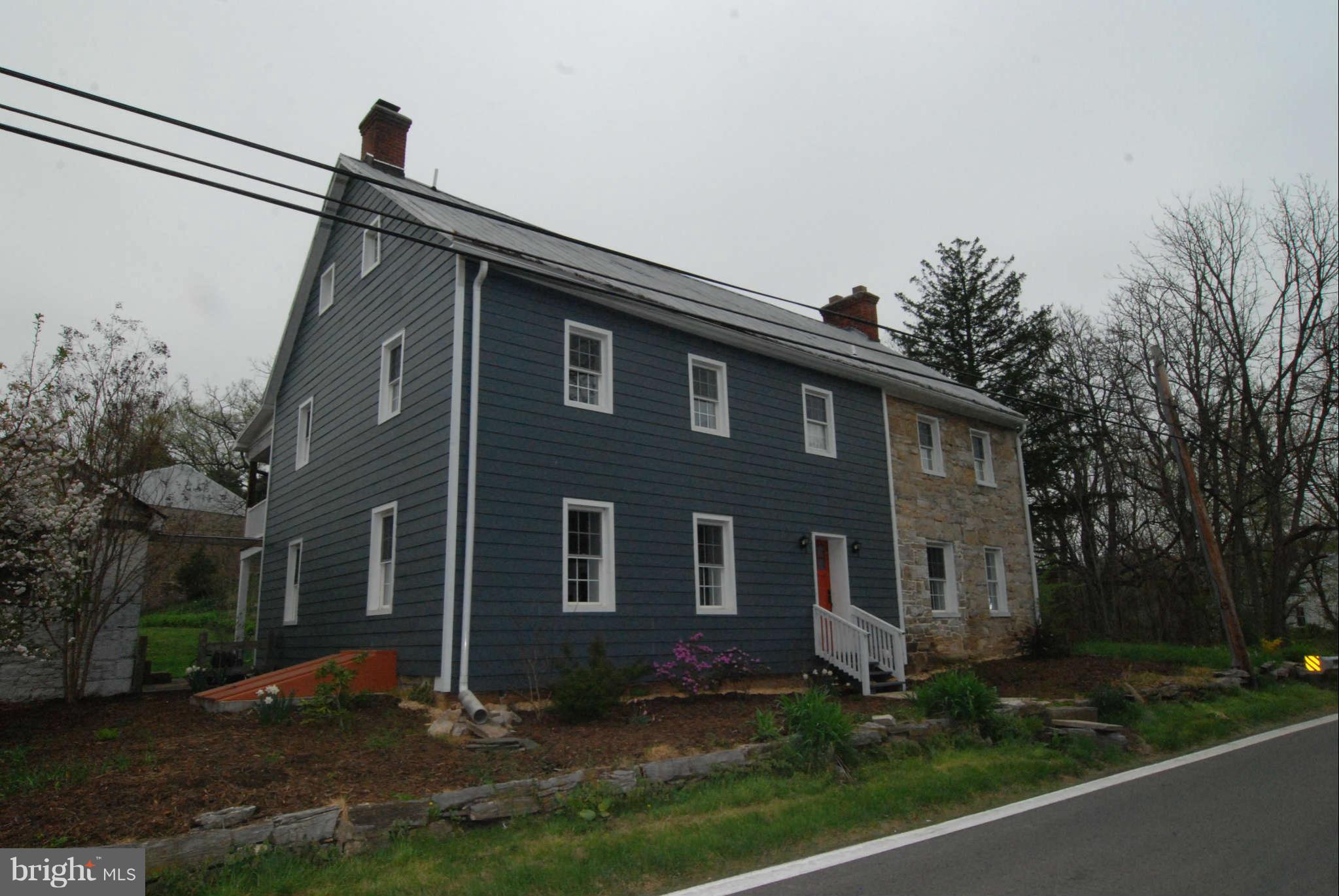 12516 Big Pool Road Clear Spring, MD 21722 - Photo 2 of 30 front view of a house with a yard