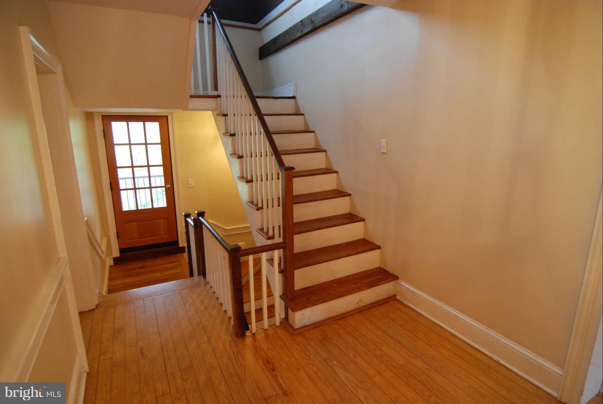 12516 Big Pool Road Clear Spring, MD 21722 - Photo 13 of 30 a view of entryway with wooden floor and stairs