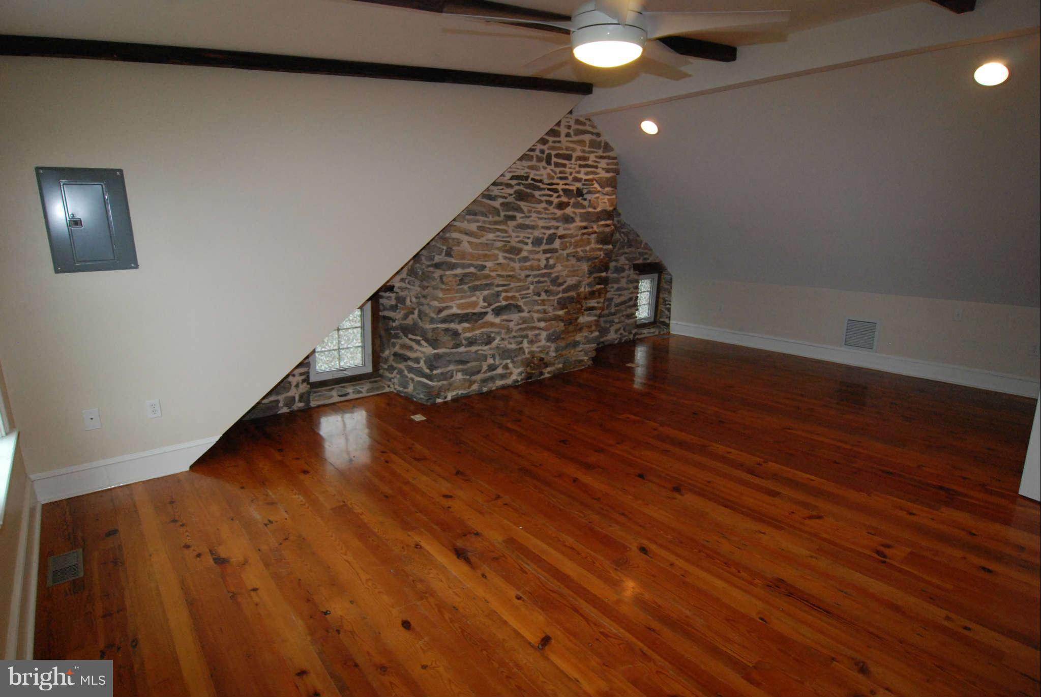 12516 Big Pool Road Clear Spring, MD 21722 - Photo 22 of 30 a view of an empty room with wooden floor