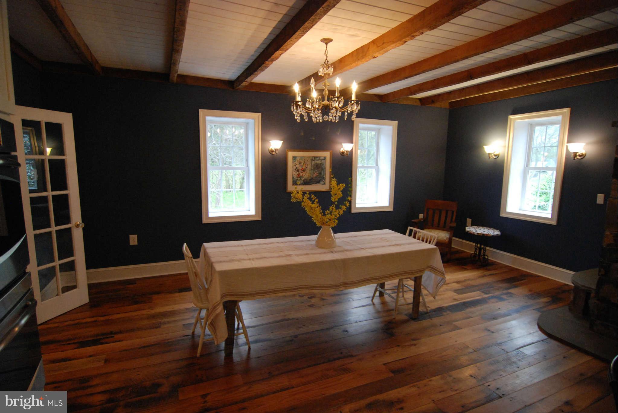 12516 Big Pool Road Clear Spring, MD 21722 - Photo 8 of 30 a view of a dining room with furniture and wooden floor