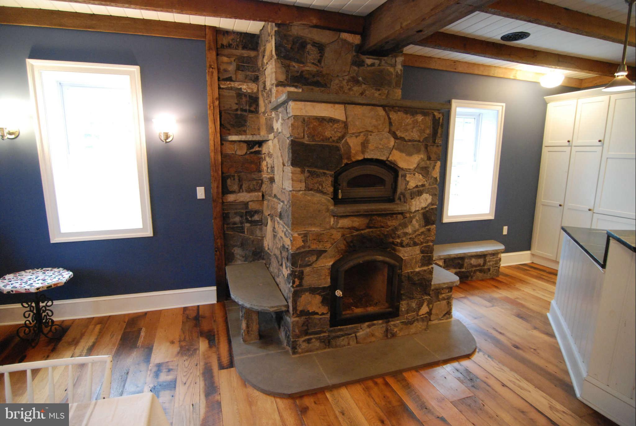 12516 Big Pool Road Clear Spring, MD 21722 - Photo 10 of 30 a living room with furniture and a fireplace