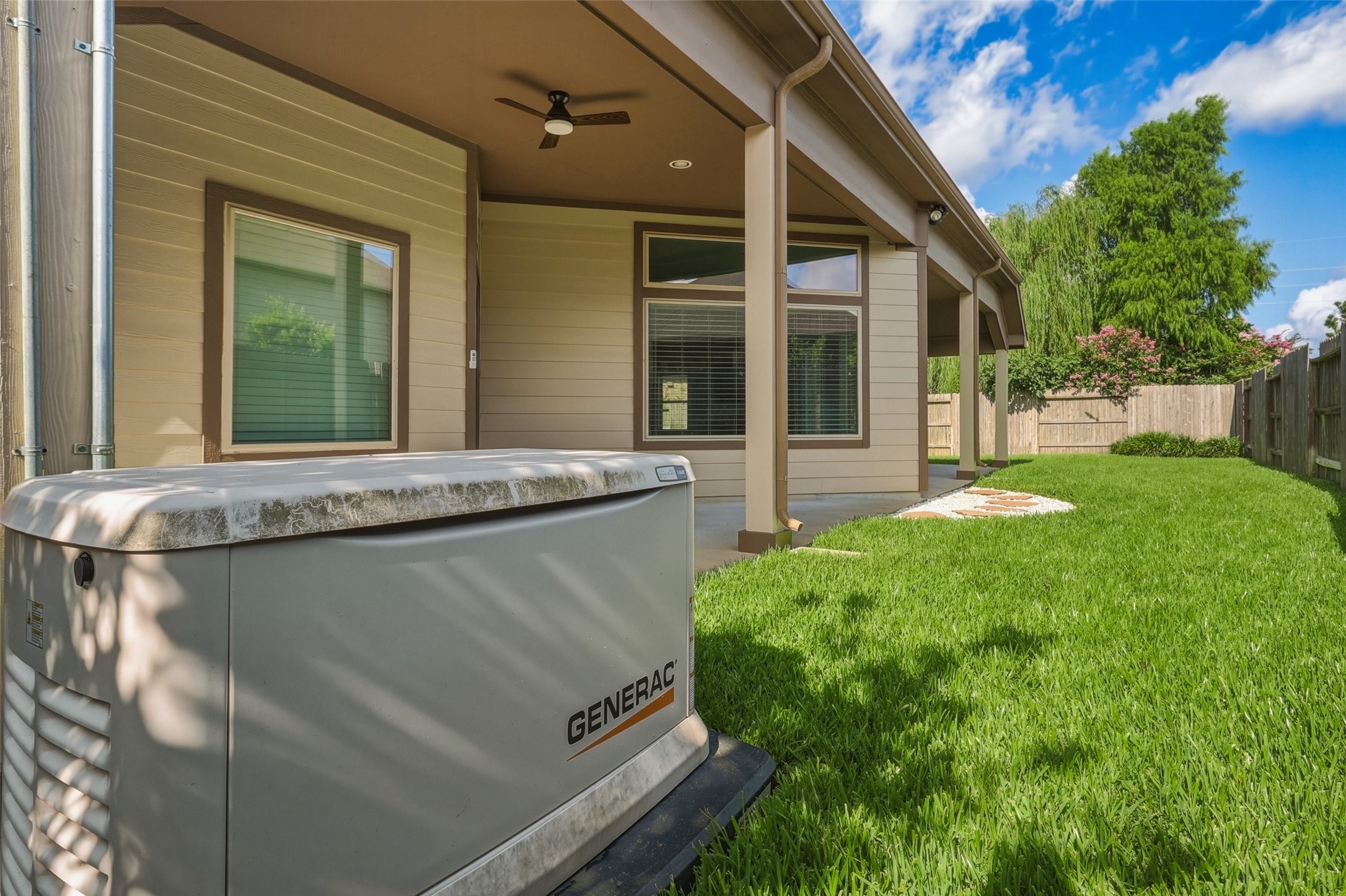 24126 Cane Fields Road Katy, TX 77493 - Photo 35 of 36 Added peace of mind with a whole-house generator installed in 2022, ensuring comfort during unexpected power outages.
