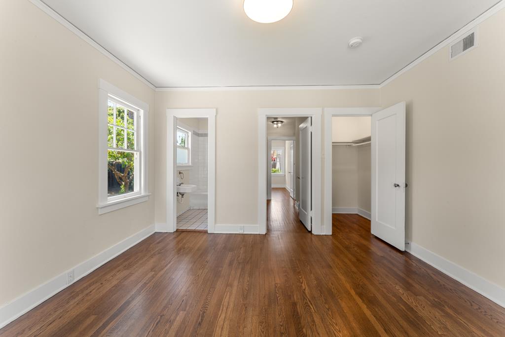395 Loreto Street Mountain View, CA 94041 - Photo 20 of 28 a big room with wooden floor and windows