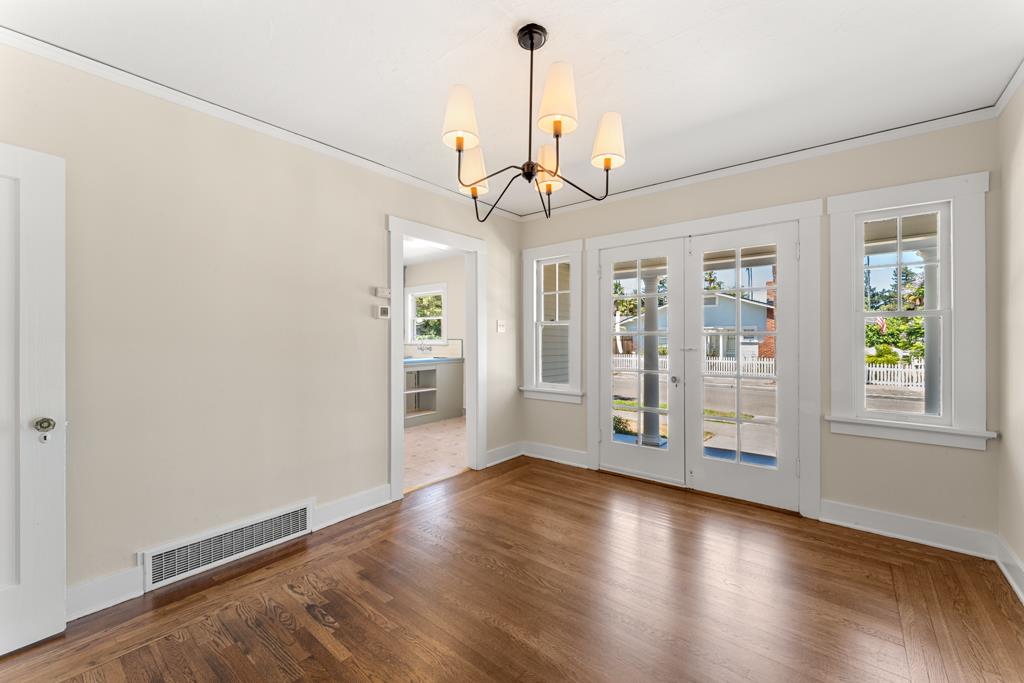 395 Loreto Street Mountain View, CA 94041 - Photo 7 of 28 a view of an empty room with window and wooden floor