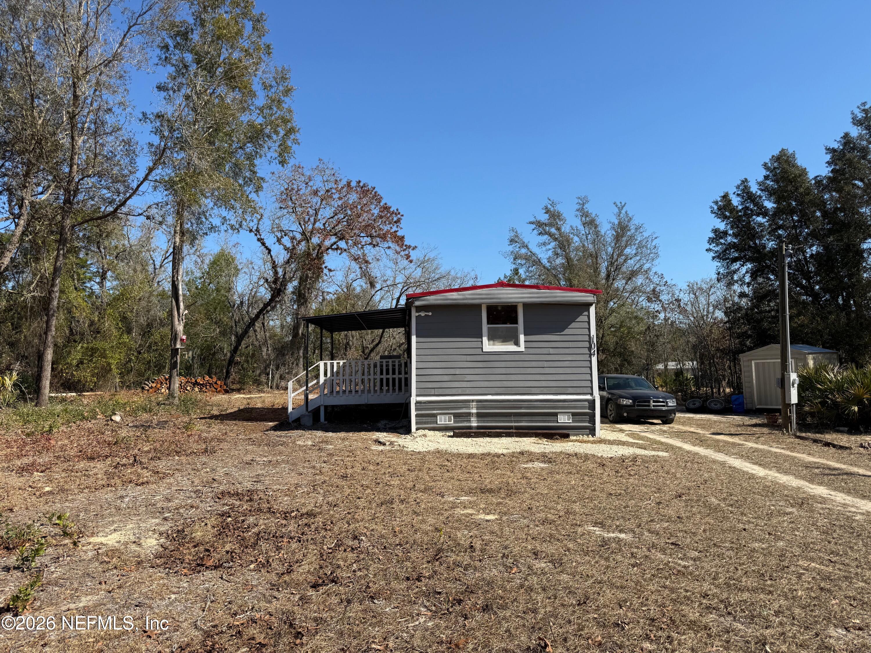 104 Churchill Street Interlachen, FL 32148 - Photo 1 of 24 a view of a house with a yard