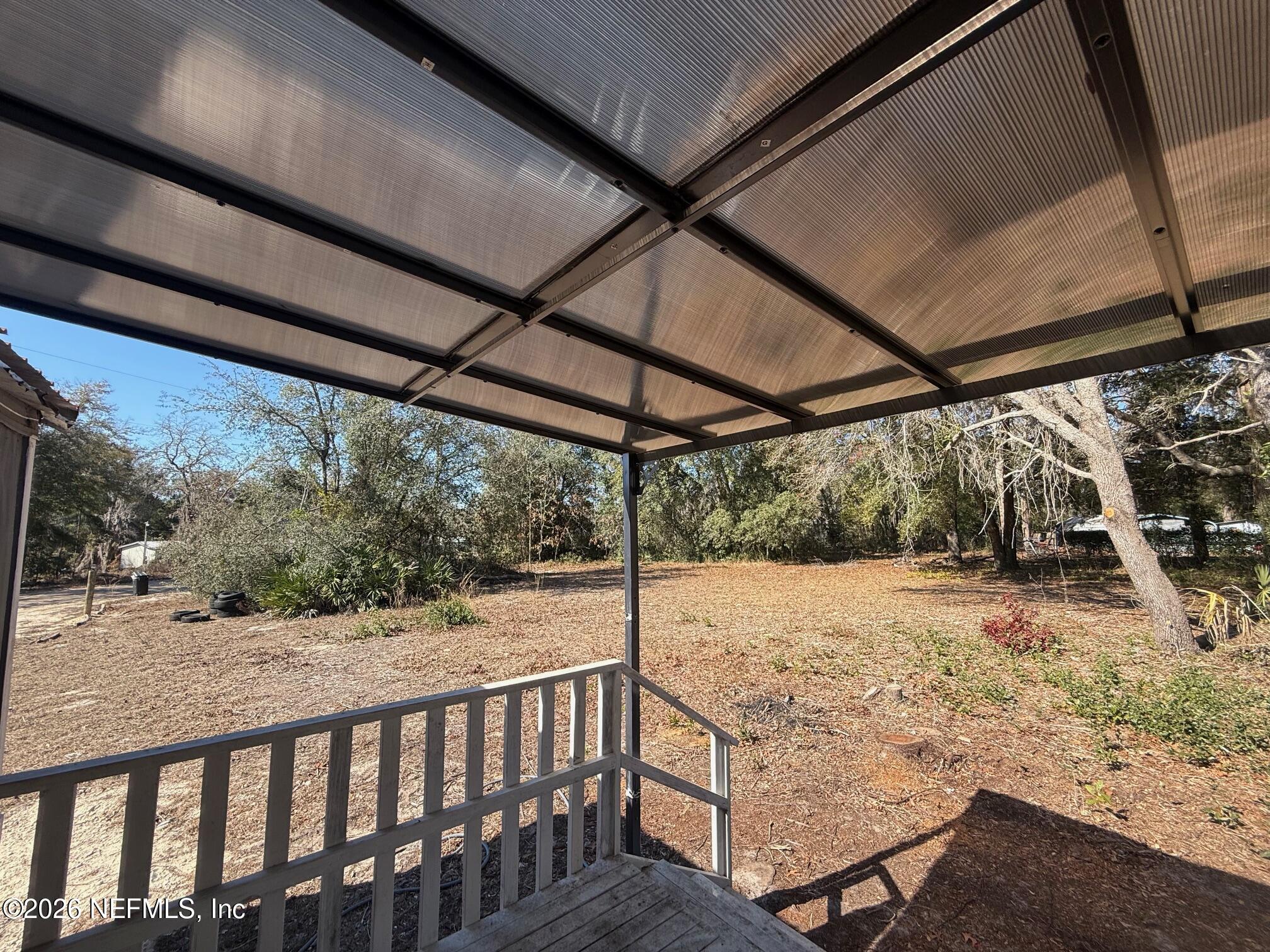 104 Churchill Street Interlachen, FL 32148 - Photo 17 of 24 a view of a backyard