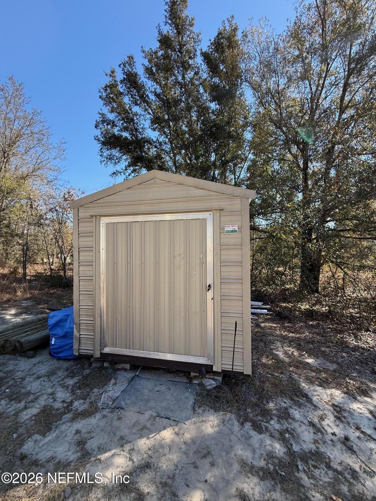 104 Churchill Street Interlachen, FL 32148 - Photo 20 of 24 a view of a house with a yard