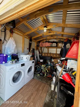 a utility room with dryer and washer