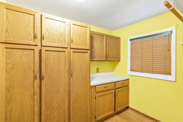 a bathroom with a sink and a window