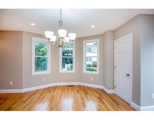 19 Laconia Avenue Saugus, MA 01906 - Photo 12 of 27 an empty room with wooden floor and windows