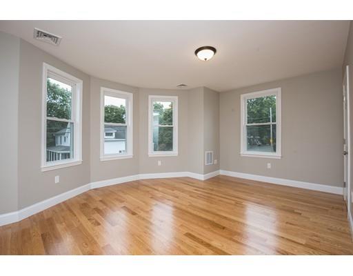 19 Laconia Avenue Saugus, MA 01906 - Photo 14 of 27 a view of an empty room with wooden floor and windows