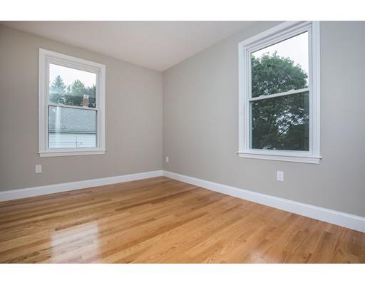 19 Laconia Avenue Saugus, MA 01906 - Photo 17 of 27 a view of an empty room with wooden floor and a window