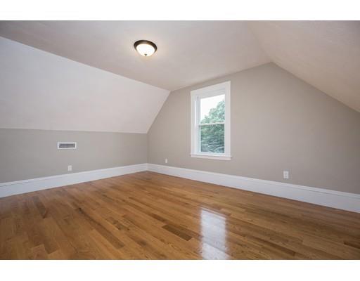 19 Laconia Avenue Saugus, MA 01906 - Photo 20 of 27 a view of an empty room with wooden floor and a window