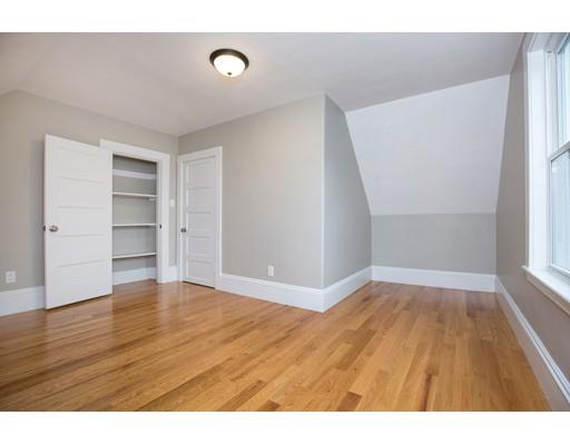 19 Laconia Avenue Saugus, MA 01906 - Photo 21 of 27 a view of an empty room with wooden floor and a window
