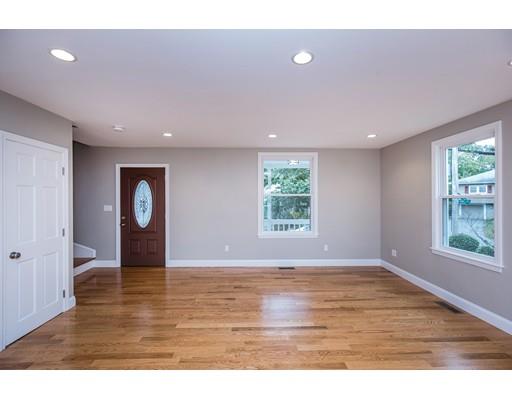 19 Laconia Avenue Saugus, MA 01906 - Photo 4 of 27 a view of an empty room with wooden floor and a window