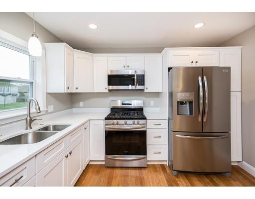 19 Laconia Avenue Saugus, MA 01906 - Photo 7 of 27 a kitchen with a refrigerator stove and sink
