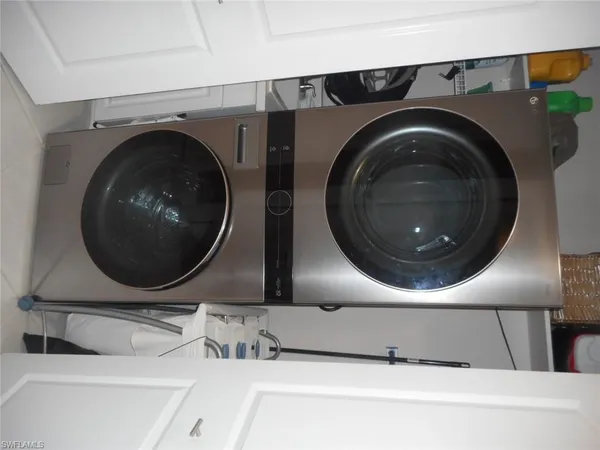 a bathroom with a toilet and shower
