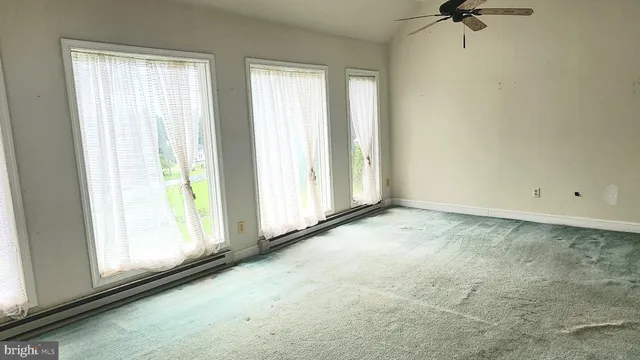 an empty room with windows