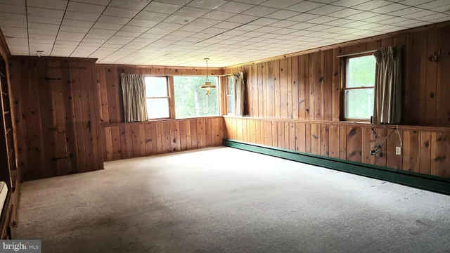 a bathroom with a toilet and a sink