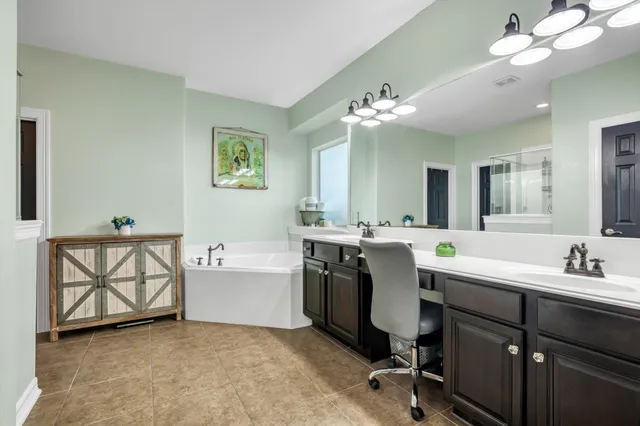 a view of hall way with furniture