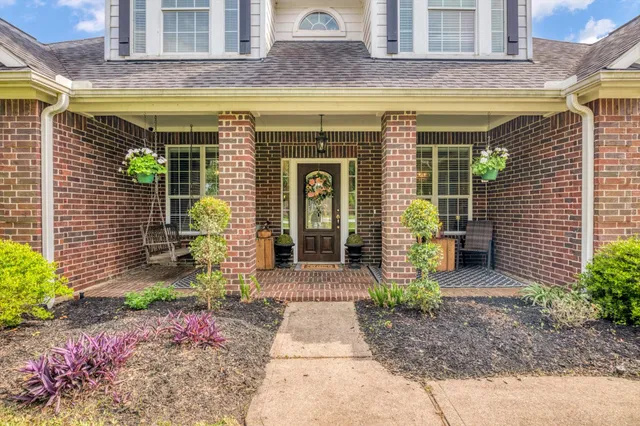 a view of a brick building with many windows