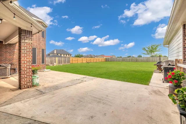 a view of a building with a yard