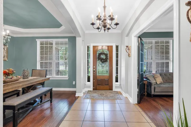 a room with furniture and a chandelier