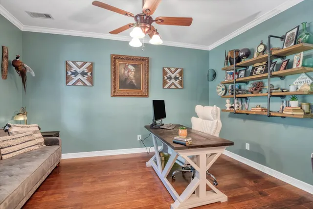 a workspace with furniture and window