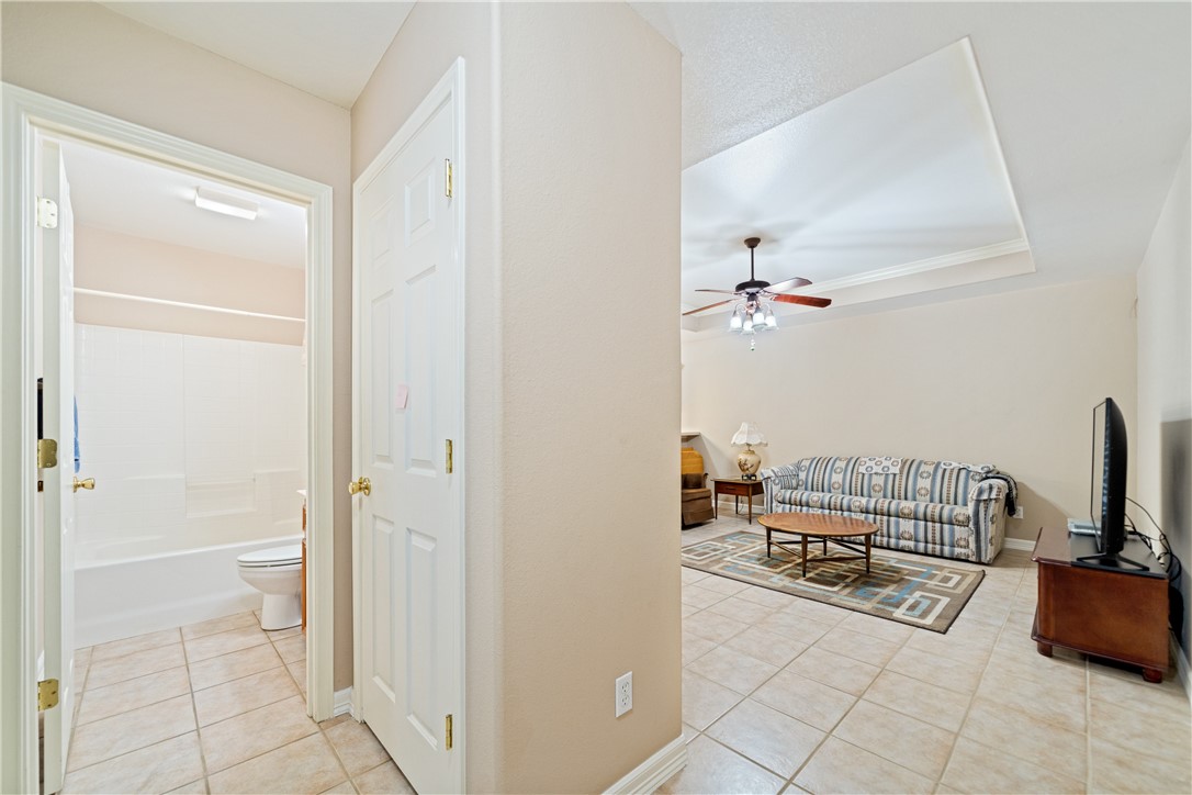 2839 McKinzie Road, Unit 10 Corpus Christi, TX 78410 - Photo 17 of 22 a walk in closet with view of bathroom