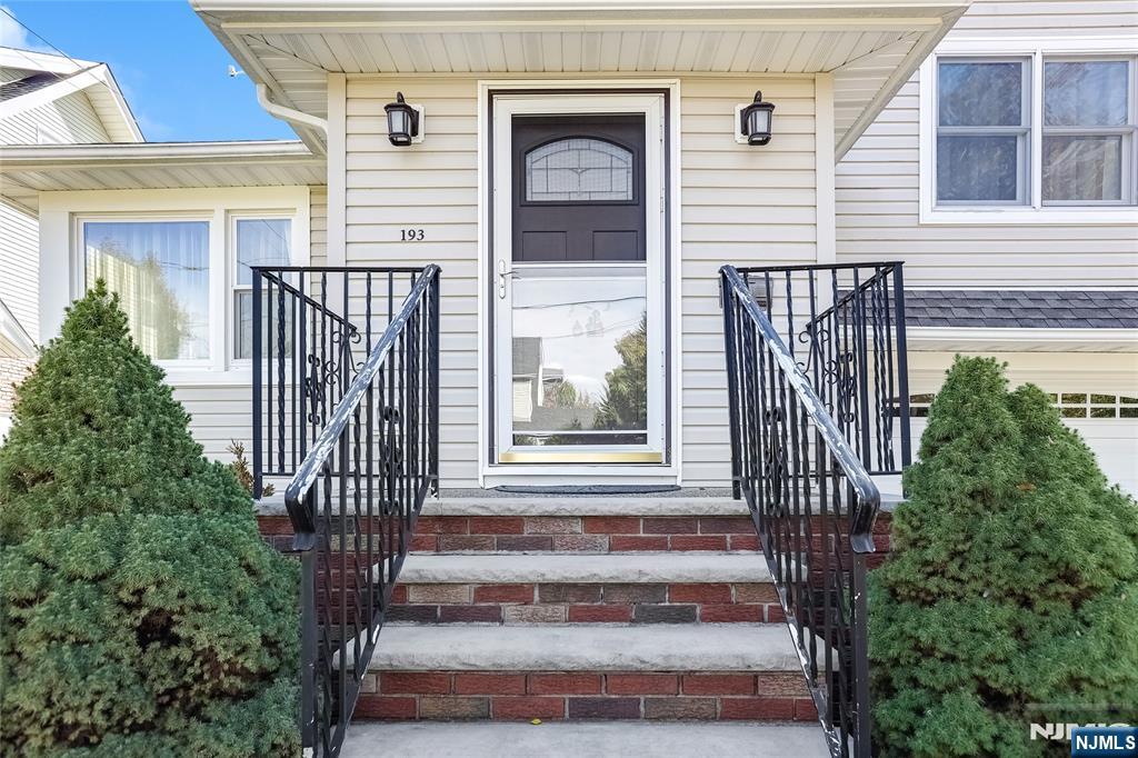 193 Prospect Place Rutherford, NJ 07070 - Photo 2 of 37 a front view of a house with a porch