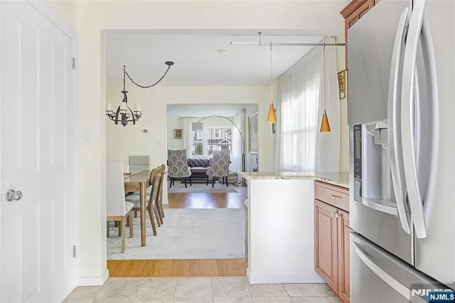 a view of a living room and a dining room