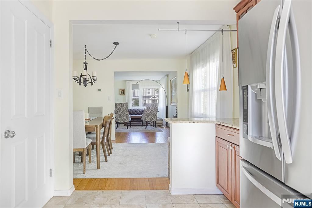 193 Prospect Place Rutherford, NJ 07070 - Photo 8 of 37 a view of a living room and a dining room