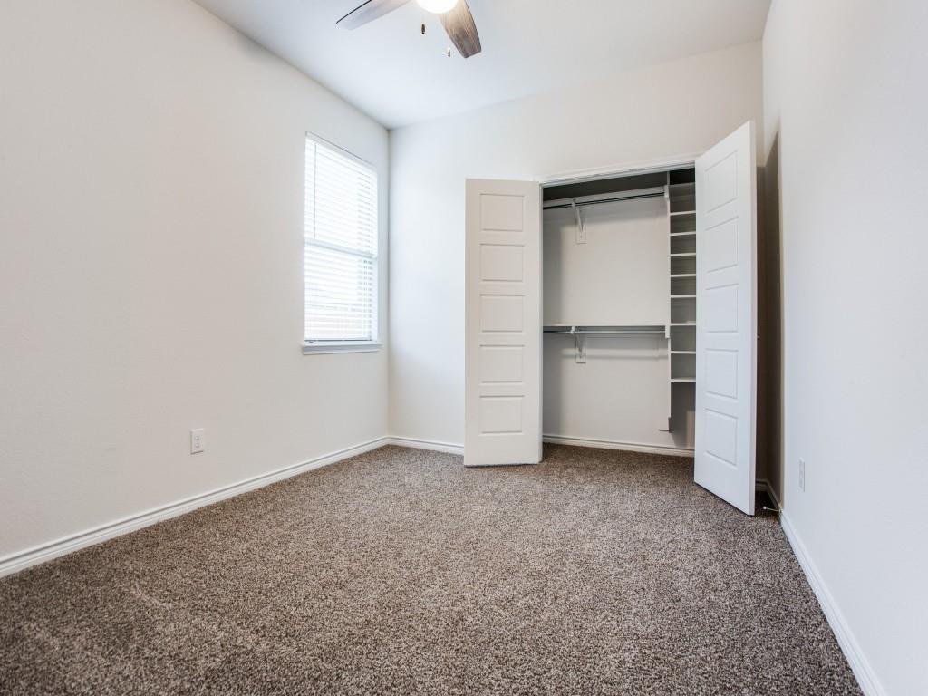 123 Lakeview Circle Pilot Point, TX 76258 - Photo 26 of 39 an empty room with a empty space and windows