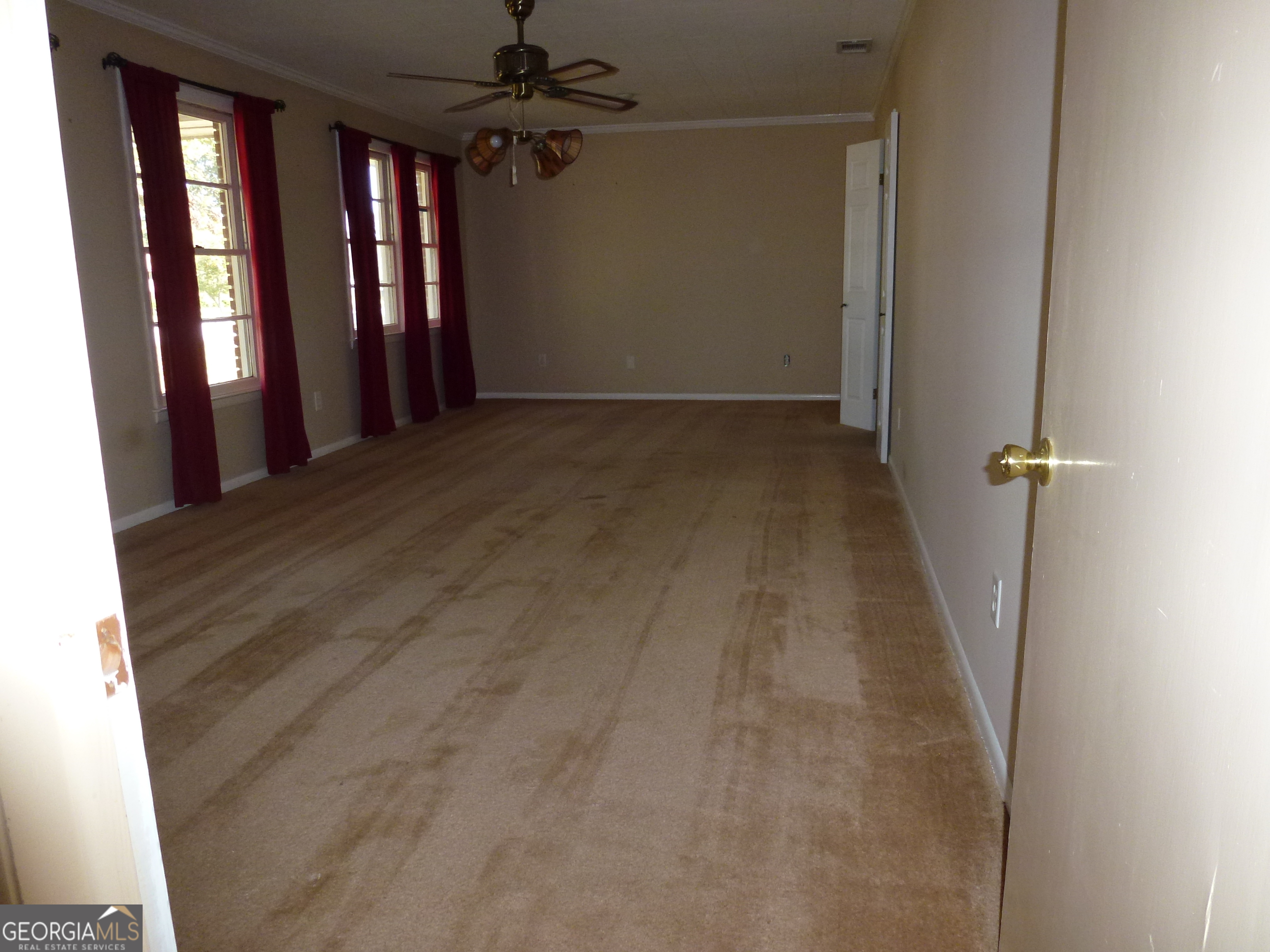 606 Park Avenue Claxton, GA 30417 - Photo 14 of 38 wooden floor in an empty room