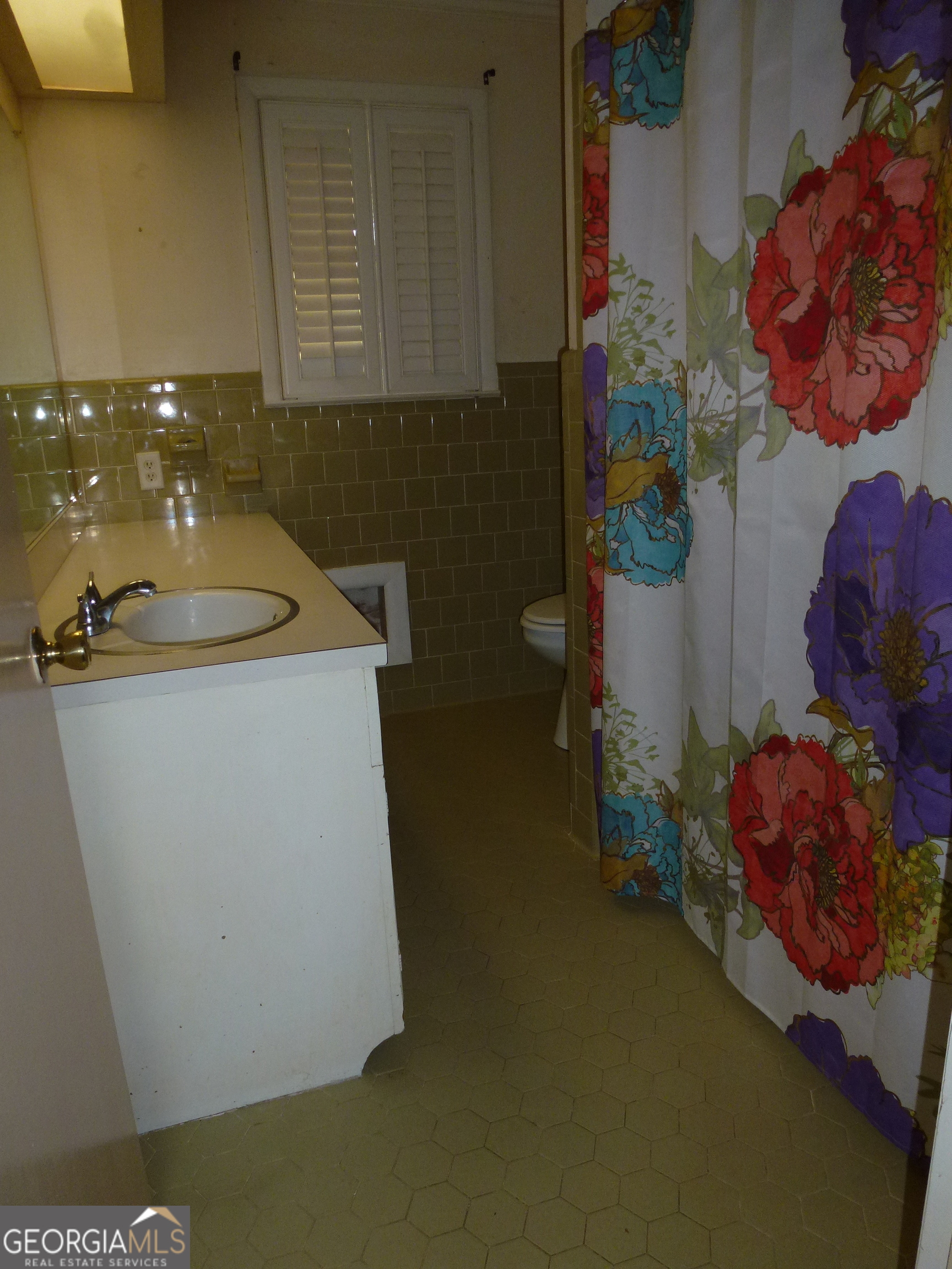 606 Park Avenue Claxton, GA 30417 - Photo 20 of 38 a utility room with dryer and washer