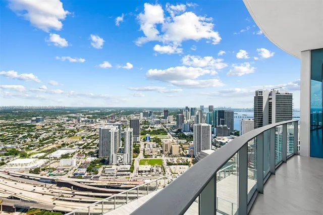 a view of a balcony with city view