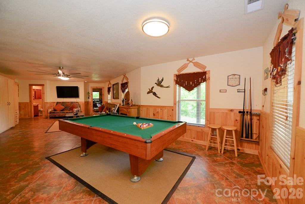 470 Bear Ridge Road Tuckasegee, NC 28783 - Photo 20 of 28 a room with table tennis pool table and windows