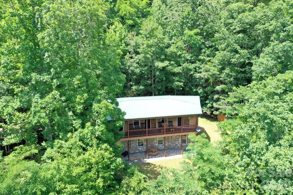 470 Bear Ridge Road Tuckasegee, NC 28783 - Photo 2 of 28 a view of a back yard