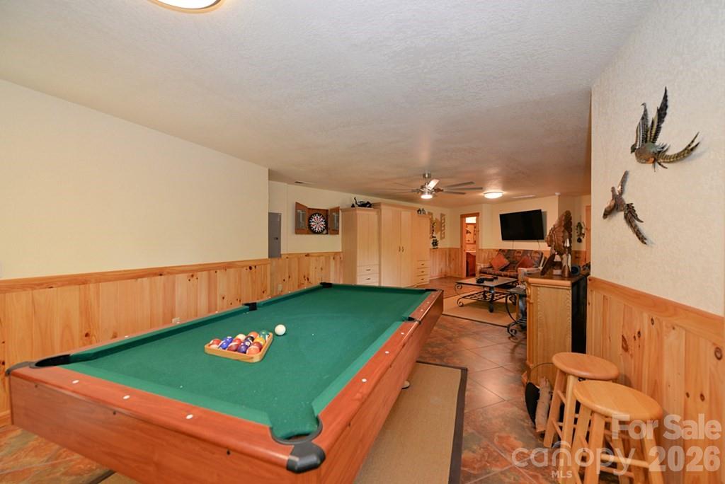 470 Bear Ridge Road Tuckasegee, NC 28783 - Photo 21 of 28 a view of a living room and kitchen