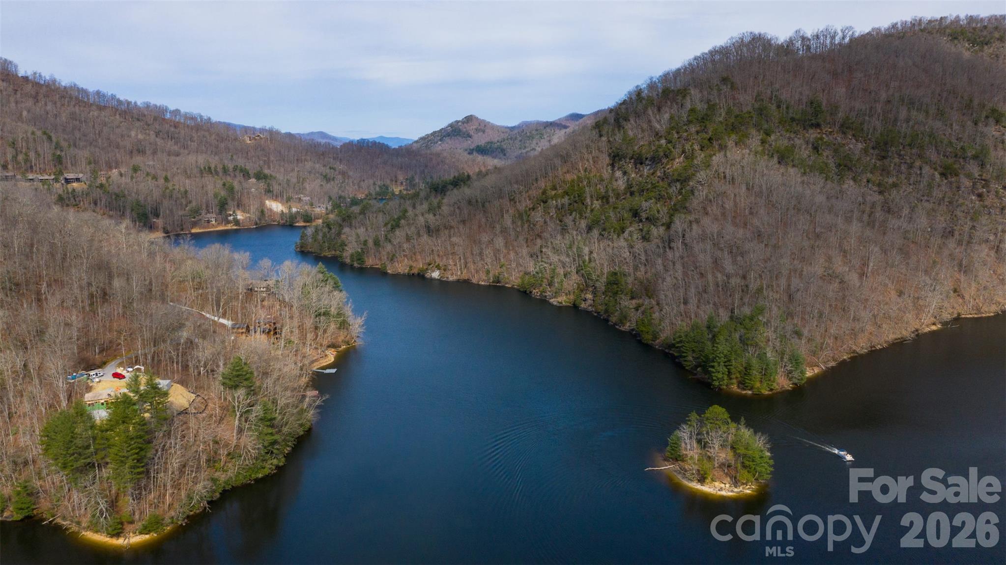 470 Bear Ridge Road Tuckasegee, NC 28783 - Photo 27 of 28 a view of a couches in a balcony
