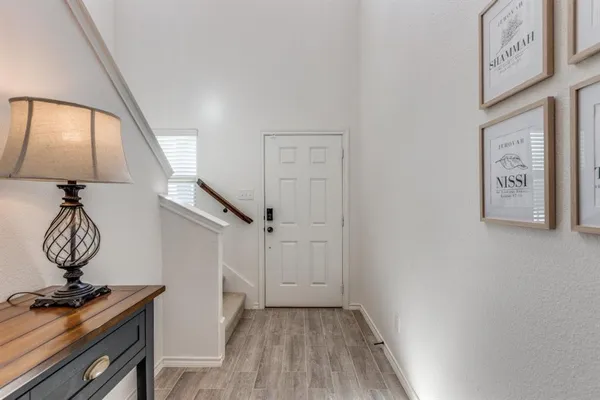 a view of entryway with wooden floor