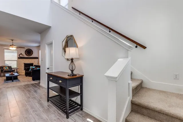 a view of a livingroom with furniture and wooden floor